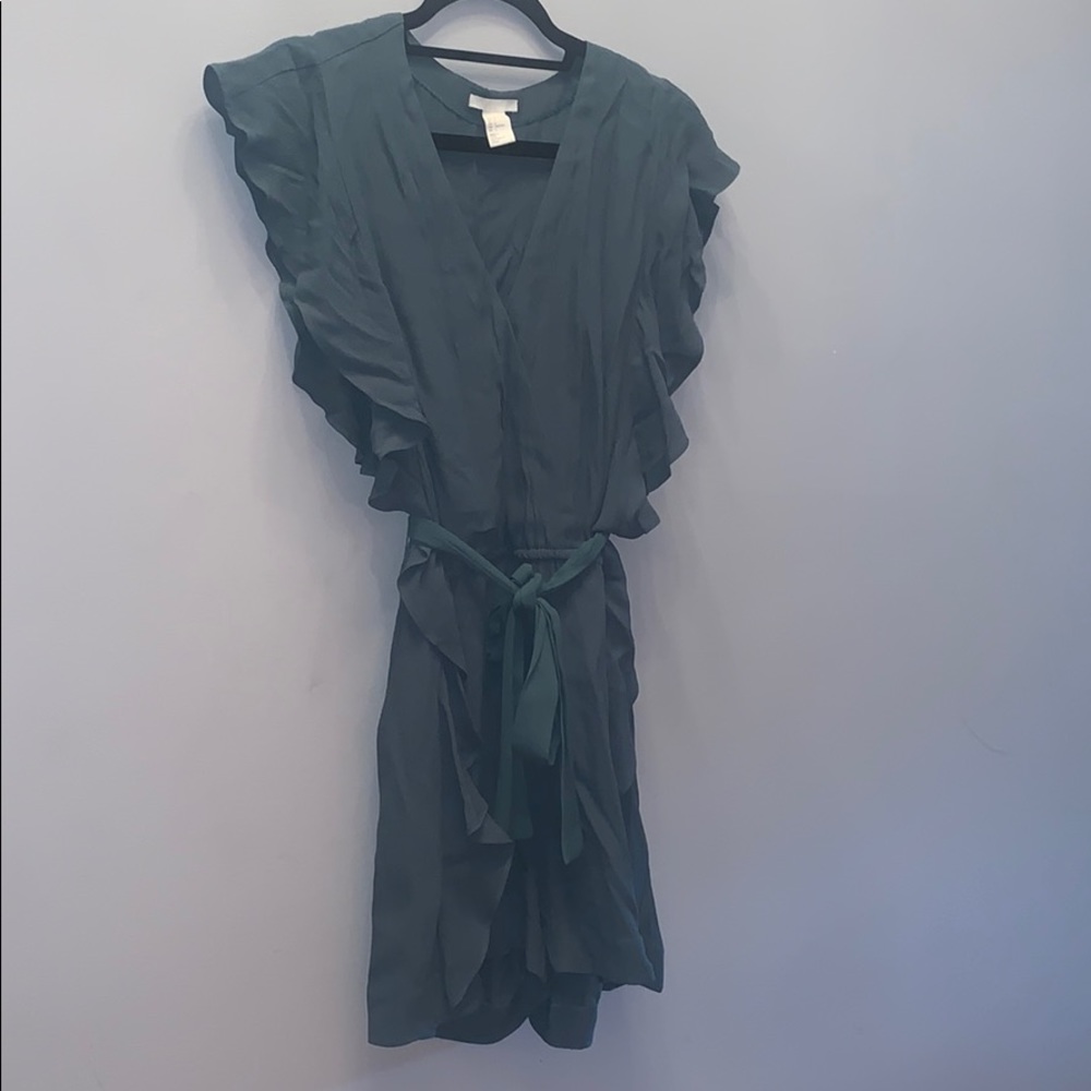 Green ruffled romper